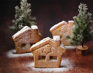 Pistazien-Häuschen mit Puderzuckerschnee